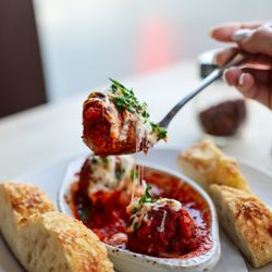Osteria 832 - Arancini - cheese filled risotto balls served with pomodoro sauce