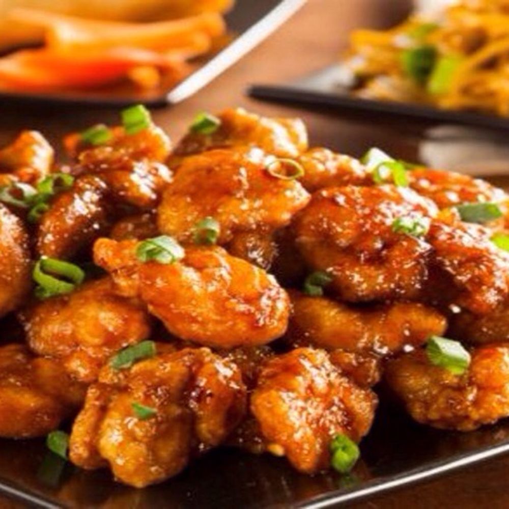 Kai Lam Kitchen - a plate of chicken and rice - Chinese Near Me - Newark, New Jersey