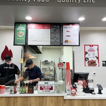 Flame Broiler - Flame broiler employees hard at work - Fast Food Near Me - Huntington Beach, California Flame Broiler - Flame broiler employees hard at work - Fast Food Near Me - Huntington Beach, California