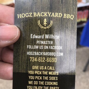 Hogz Backyard BBQ - a hand holding a business card - Food Trucks Near Me Hogz Backyard BBQ - a hand holding a business card - Food Trucks Near Me