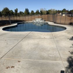 Freeform Pool with water feature.