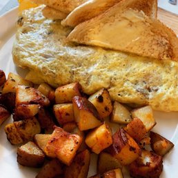 an omelet and potatoes