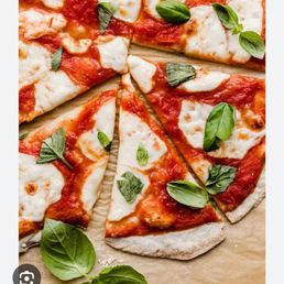 This is what I was expecting after ordering a Margherita pizza. Boy was I disappointed. This is what I was expecting after ordering a Margherita pizza. Boy was I disappointed.
