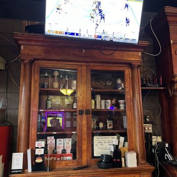 Corner Bar & Grill - a tv on top of a cabinet - Bars Near Me - St Charles, Missouri