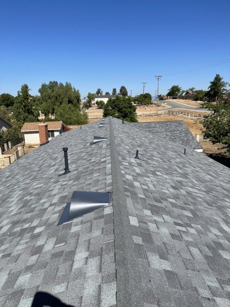 Slide of Manna Roofing Company