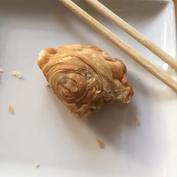 Pho Basil - Curry puff ($5.50 for three). So focused on eating I forgot to take a photo until halfway through eating! - Vietnamese Near Me - Boston, Massachusetts