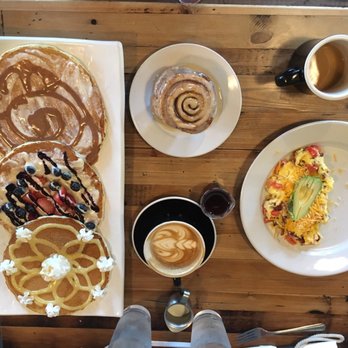 Seven Mile Cafe - Pancake trio (cinnamon roll, berry, lemon) coffees, omelette & cinnamon bun side that came with the omelette - Breakfast & Brunch Near Me - Keller, Texas Seven Mile Cafe - Pancake trio (cinnamon roll, berry, lemon) coffees, omelette & cinnamon bun side that came with the omelette - Breakfast & Brunch Near Me - Keller, Texas