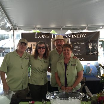 Lone Hen Winery - a group of people standing under a tent - Wineries Near Me - College Station, Texas Lone Hen Winery - a group of people standing under a tent - Wineries Near Me - College Station, Texas