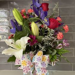 Emile's Floral Design - New bouquet - 3 irises - not what I paid for