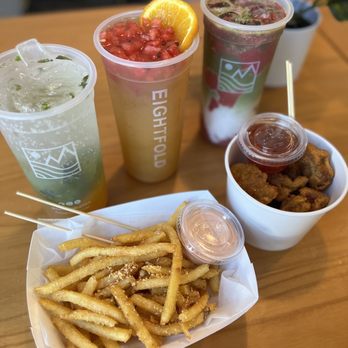 Eightfold Tea Shoppe - Spread: Drinks: Summer Lojito, 4 Noble Fruit Tea, Strawberry Matcha Snacks: Parmesan fries popcorn chicken - Bubble Tea Near Me - Costa Mesa, California Eightfold Tea Shoppe - Spread: Drinks: Summer Lojito, 4 Noble Fruit Tea, Strawberry Matcha Snacks: Parmesan fries popcorn chicken - Bubble Tea Near Me - Costa Mesa, California
