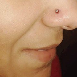 Purple Dot Piercings and Gifts - Nose piercing