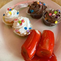 Tokyo Grill Sushi & Supreme Buffet - Chocolate cupcakes, vanilla cupcakes bananas with strawberry glaze.