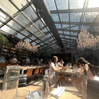 NOMO Kitchen - Inside with sun - New American Near Me - New York, New York
