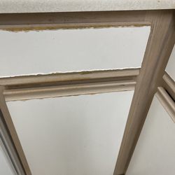 North Beach Realty - More peeling cabinets