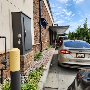 Chick-fil-A - Long wait. Trash at the drive thru window where things get dropped. Food was hot and tasty! - Fast Food Near Me - Cambridge, Maryland