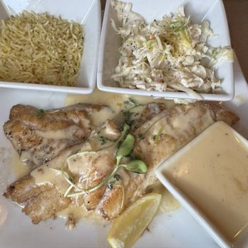 Crabby's Oyster Bar - Yellowtail Fresh catch of the day entree sautéed with lemon cream sauce, with Island Cilantro Rice and Coleslaw - Seafood Near Me - Jensen Beach, Florida