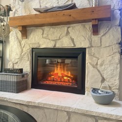 Chimney Concepts - One side of a beautiful electric fireplace