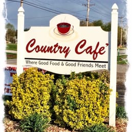 a sign with a cup of coffee a sign with a cup of coffee