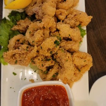 Italian Pizza Kitchen - Calamari with the xute little tabasco hot sauce. - Italian Near Me - Roselle, Illinois