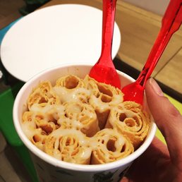 Thai Ice Tea Ice Cream with Lychee and cornflakes mixed in and a condensed milk drizzle; LOVED IT!