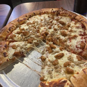 Mama's Pizza - I'm using the requested pie server to lift pizza from requested platter. :) Everyone else was eating out of a box. - Pizza Near Me - Mansfield, Texas Mama's Pizza - I'm using the requested pie server to lift pizza from requested platter. :) Everyone else was eating out of a box. - Pizza Near Me - Mansfield, Texas
