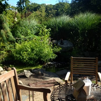 Dave's Coffee - Many places to sit outdoors. This is just one of the more tucked away ones. - Coffee & Tea Near Me - Charlestown, Rhode Island