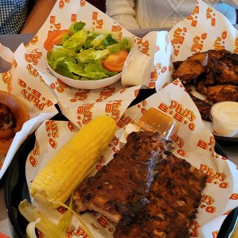 Phil's BBQ - Baby back rib, barbecue wings, garden salad, and onion rings. - Barbeque Near Me - San Diego, California Phil's BBQ - Baby back rib, barbecue wings, garden salad, and onion rings. - Barbeque Near Me - San Diego, California