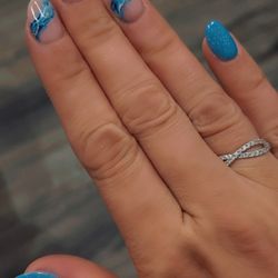 Shades of Nails & Spa - Dip mani with gel top coat and designs.
