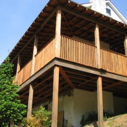 David G. Degezelle,General Contractor - finished porch;  salvaged wood used to build porch;