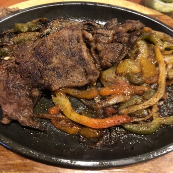 Casa Grande - steak and peppers in a skillet - Mexican Near Me - Hohenwald, Tennessee
