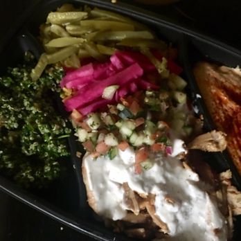Baba G Mediterranean Grill - Chicken shawarma with tzatziki sauce traditional style with spicy hummus and tabbouleh.  So yummy! - Mediterranean Near Me - Oklahoma City, Oklahoma