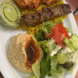 Chicken and Beef plate which includes rice, Green Salsa Cup and Pita Bread Hummus Chicken and Beef plate which includes rice, Green Salsa Cup and Pita Bread Hummus