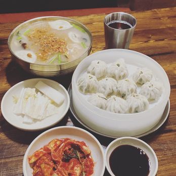 Mdk Noodles - Pork dumplings (18), Knife Cut Noodle in Chicken Broth (Kalguksu) (18$), and kimchi. - Korean Near Me - Anaheim, California Mdk Noodles - Pork dumplings (18), Knife Cut Noodle in Chicken Broth (Kalguksu) (18$), and kimchi. - Korean Near Me - Anaheim, California