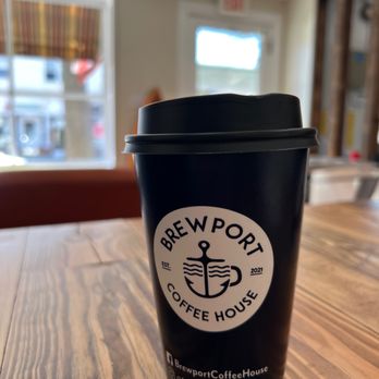 Brewport Coffee House - a cup of coffee on a table - Coffee & Tea Near Me - Bellport, New York