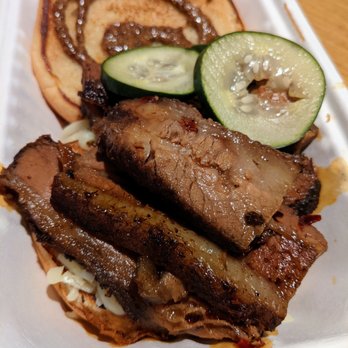 Succotash Southern and Creole Kitchen - Smoked Brisket Sandwich. Sharp cheddar, balsamic mustard, house pickles, caramelized onion BBQ on sandwich roll. $12.07. - Southern Near Me - Durham, North Carolina