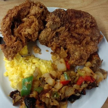 The Serving Spoon - One pork chop, one turkey chop, eggs and b'fast potatos. Sofa king good! - Breakfast & Brunch Near Me - Inglewood, California
