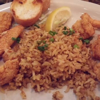 Evangeline Café - Seafood Platter with catfish and shrimp coated in corn meal with dirty rice. - Cajun/Creole Near Me - Austin, Texas Evangeline Café - Seafood Platter with catfish and shrimp coated in corn meal with dirty rice. - Cajun/Creole Near Me - Austin, Texas
