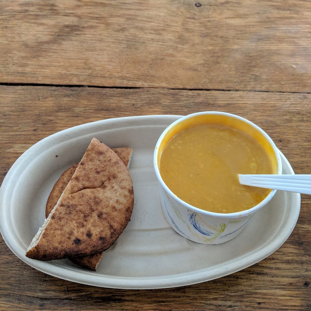 Dates and Olives Natick - Cup of butternut squash soup with pita - Mediterranean Near Me - Natick, Massachusetts Dates and Olives Natick - Cup of butternut squash soup with pita - Mediterranean Near Me - Natick, Massachusetts
