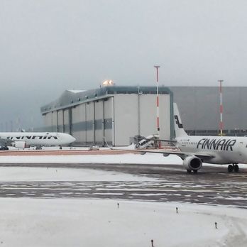 Finnair - Departing for LIS, going to the deicing area, being followed by an Embraer, and seeing an A-330 with covered engine nacelles beyond. - Airlines Near Me - Vantaa, 18 Finnair - Departing for LIS, going to the deicing area, being followed by an Embraer, and seeing an A-330 with covered engine nacelles beyond. - Airlines Near Me - Vantaa, 18