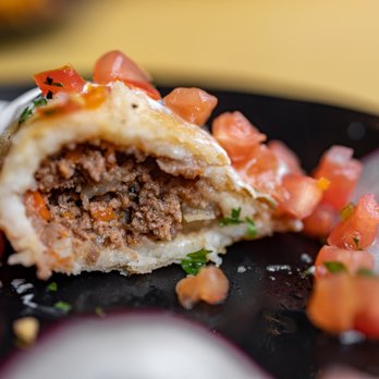 Mayan Kitchen Food - Wagyu Beef Corn Empanada cross-section - Latin American Near Me - Sunnyvale, California Mayan Kitchen Food - Wagyu Beef Corn Empanada cross-section - Latin American Near Me - Sunnyvale, California