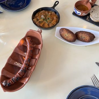 Petiscos - Codfish cakes, beef tongue in tomato sauce, and flamed chouriço - Portuguese Near Me - San Jose, California
