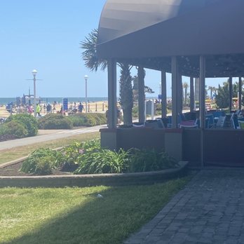 Hampton Inn Virginia Beach-Oceanfront North - Breakfast patio right by the ocean. - Hotels Near Me - Virginia Beach, Virginia Hampton Inn Virginia Beach-Oceanfront North - Breakfast patio right by the ocean. - Hotels Near Me - Virginia Beach, Virginia