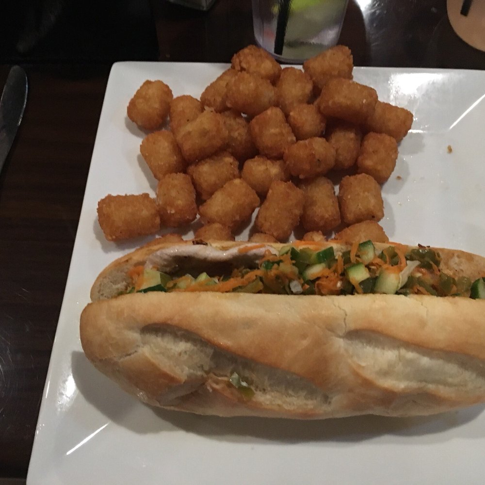 The Hidden Still - Banh Mi with a side of crispy tater tots. - Bars Near Me - Ellington, Connecticut The Hidden Still - Banh Mi with a side of crispy tater tots. - Bars Near Me - Ellington, Connecticut