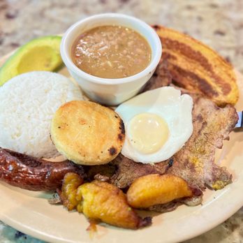 Moliendo cafe - Bandeja Paisa - Colombian Near Me - Albany, New York Moliendo cafe - Bandeja Paisa - Colombian Near Me - Albany, New York