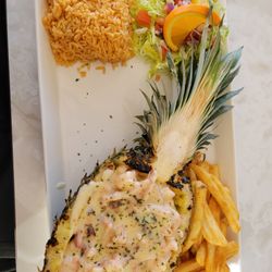Dells Diner & Mariscos Nayarit - Piñita Marinera
Pineapple filled with octopus, shrimp & calamari, topped with sweet and sour spicy sauce.
