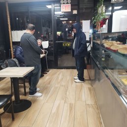 Disappointed -- food is good but the owners and delivery men all sit up front, not wearing masks. It's a global pandemic in New York Disappointed -- food is good but the owners and delivery men all sit up front, not wearing masks. It's a global pandemic in New York