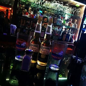 Gardens Tavern Bar - bottles of beer on the bar - Cocktail Bars Near Me - Hialeah Gardens, Florida