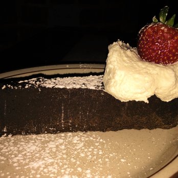The Beehive - The sinfully good flourless chocolate cake. - American Near Me - Boston, Massachusetts The Beehive - The sinfully good flourless chocolate cake. - American Near Me - Boston, Massachusetts