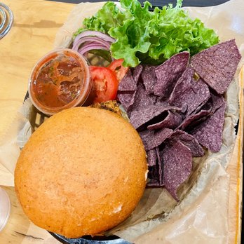 Middle Way Cafe - Alaskan Salmon Filet on a bun - Juice Bars & Smoothies Near Me - Anchorage, Alaska Middle Way Cafe - Alaskan Salmon Filet on a bun - Juice Bars & Smoothies Near Me - Anchorage, Alaska
