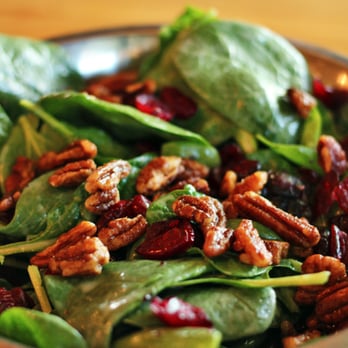 Pinthouse Pizza - Delicious spinach salad with poppy seed dressing, cranberries and walnuts. - Pizza Near Me - Austin, Texas Pinthouse Pizza - Delicious spinach salad with poppy seed dressing, cranberries and walnuts. - Pizza Near Me - Austin, Texas